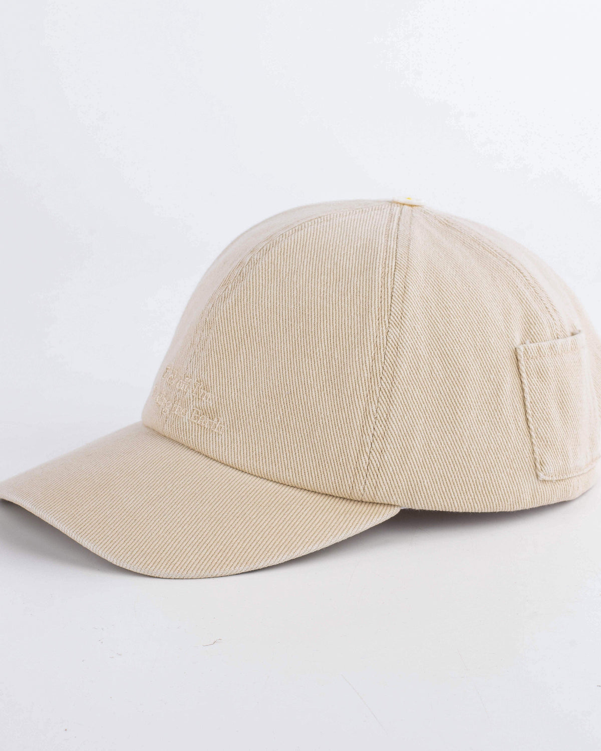 Beige baseball cap on a white background