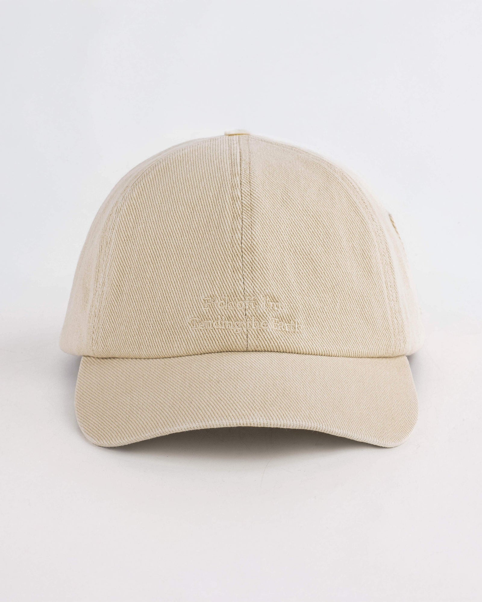 Beige baseball cap on a white background